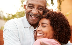 Older couple hugging