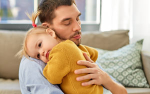 Father hugging daughter